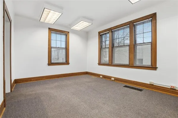 an empty room with windows