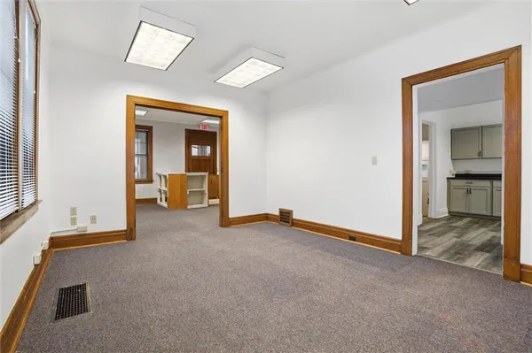 a view of a room with a bathroom