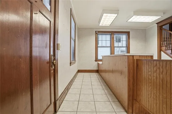 a view of a hallway with windows