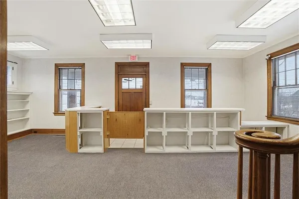 a view of a livingroom with furniture and window