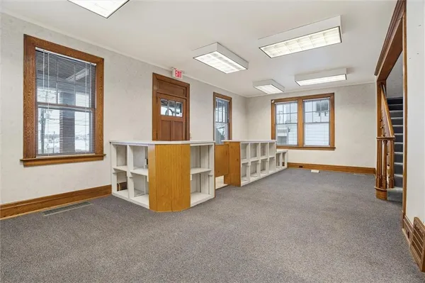 a view of an empty room with a window