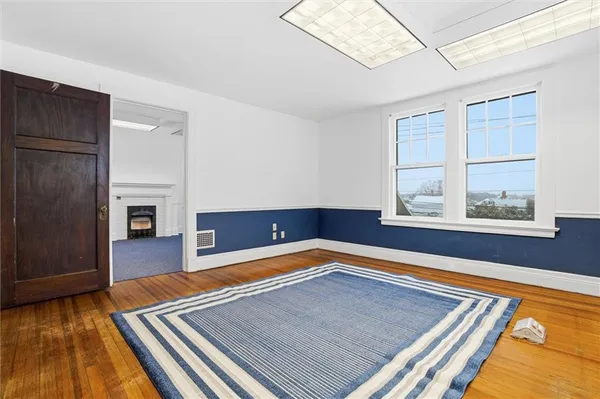 a living room with a rug