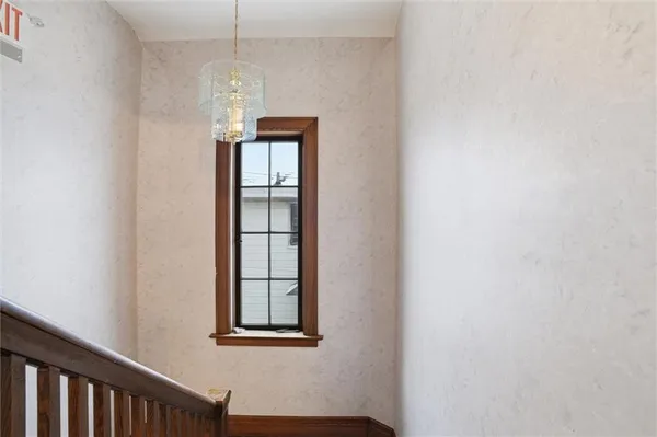 a view of an entryway with a window