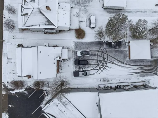 a kitchen with a stove and cabinets