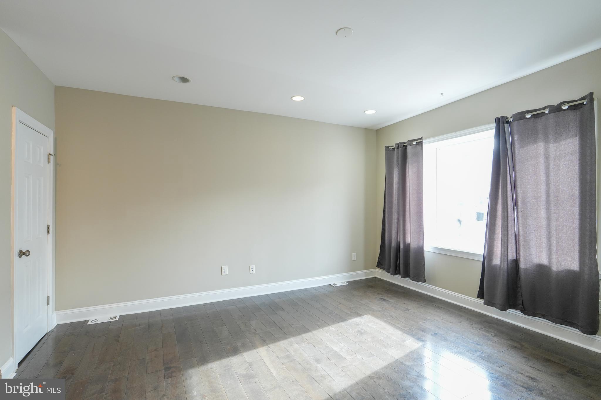 2633 Tasker Street Philadelphia, PA 19145 - Photo 11 of 23 an empty room with windows