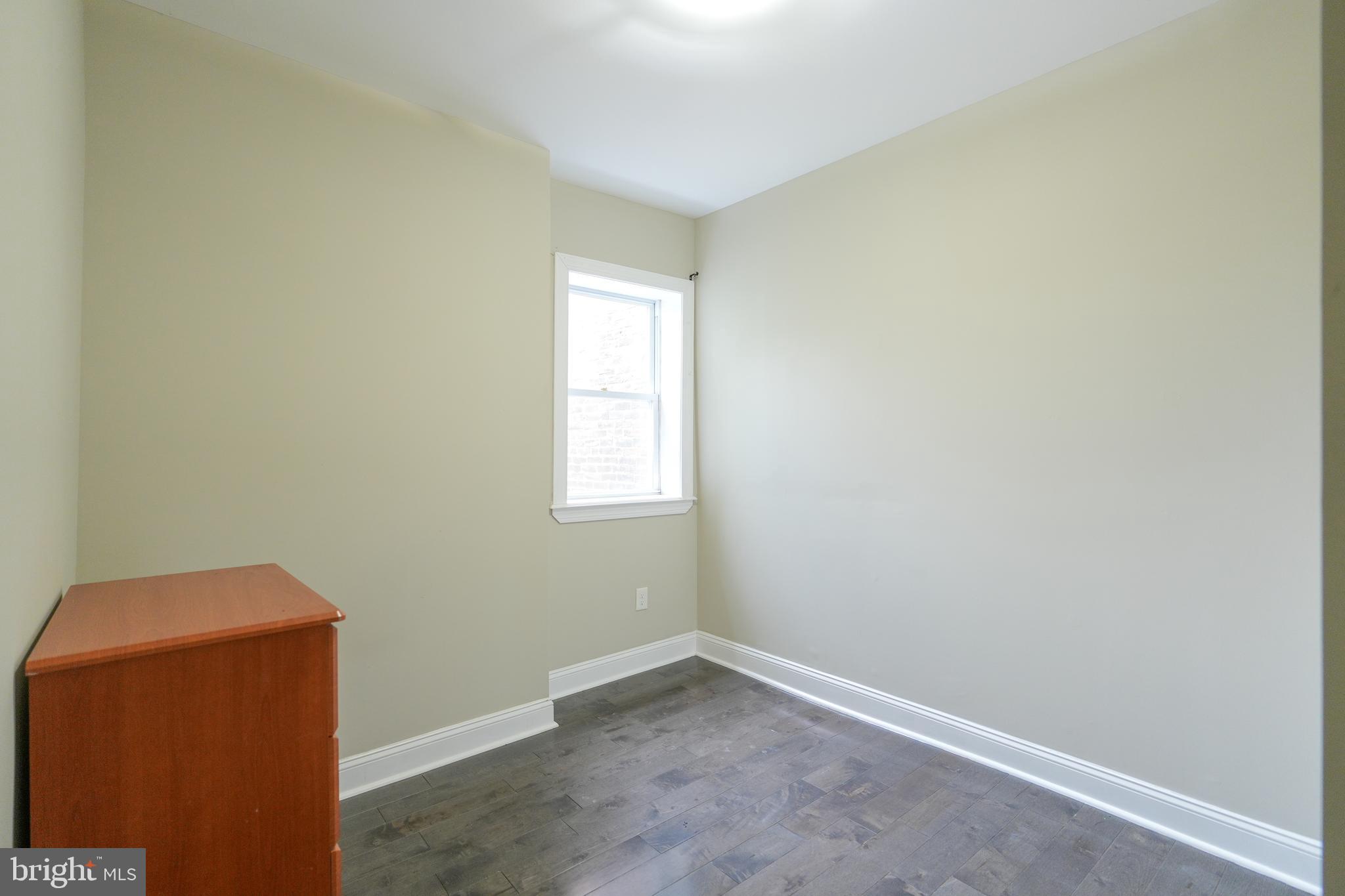2633 Tasker Street Philadelphia, PA 19145 - Photo 15 of 23 an empty room with a window