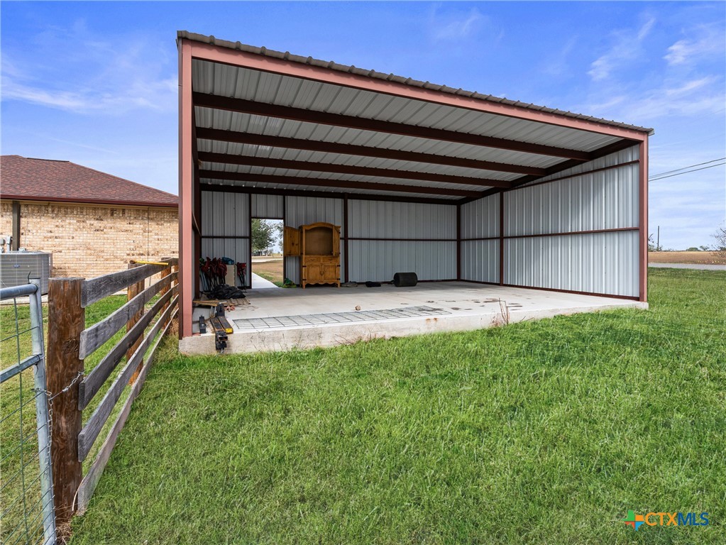 782 Santa Clara Loop Marion, TX 78124 - Photo 16 of 48 a view of a backyard with a large tree