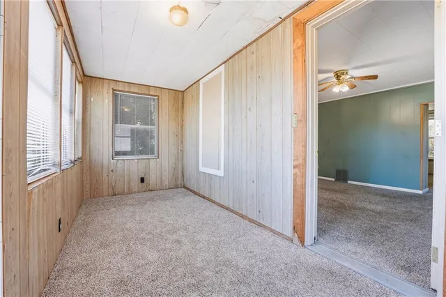 an empty room with windows