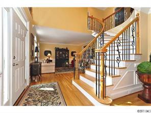 1502 Windy Ridge Road Charlotte, NC 28270 - Photo 2 of 15 a view of entryway and hall with wooden floor