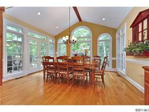 1502 Windy Ridge Road Charlotte, NC 28270 - Photo 7 of 15 a view of a dining room with furniture window and wooden floor