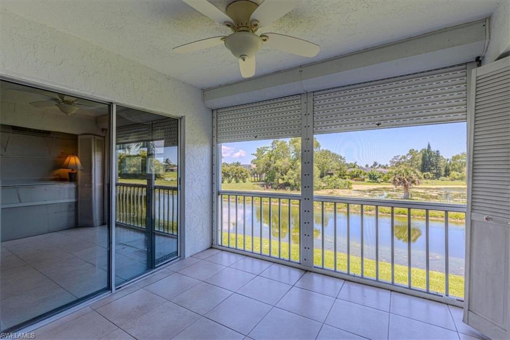 5483 Rattlesnake Hammock Road, Unit B201 Naples, FL 34113 - Photo 20 of 22 a view of a city from a balcony
