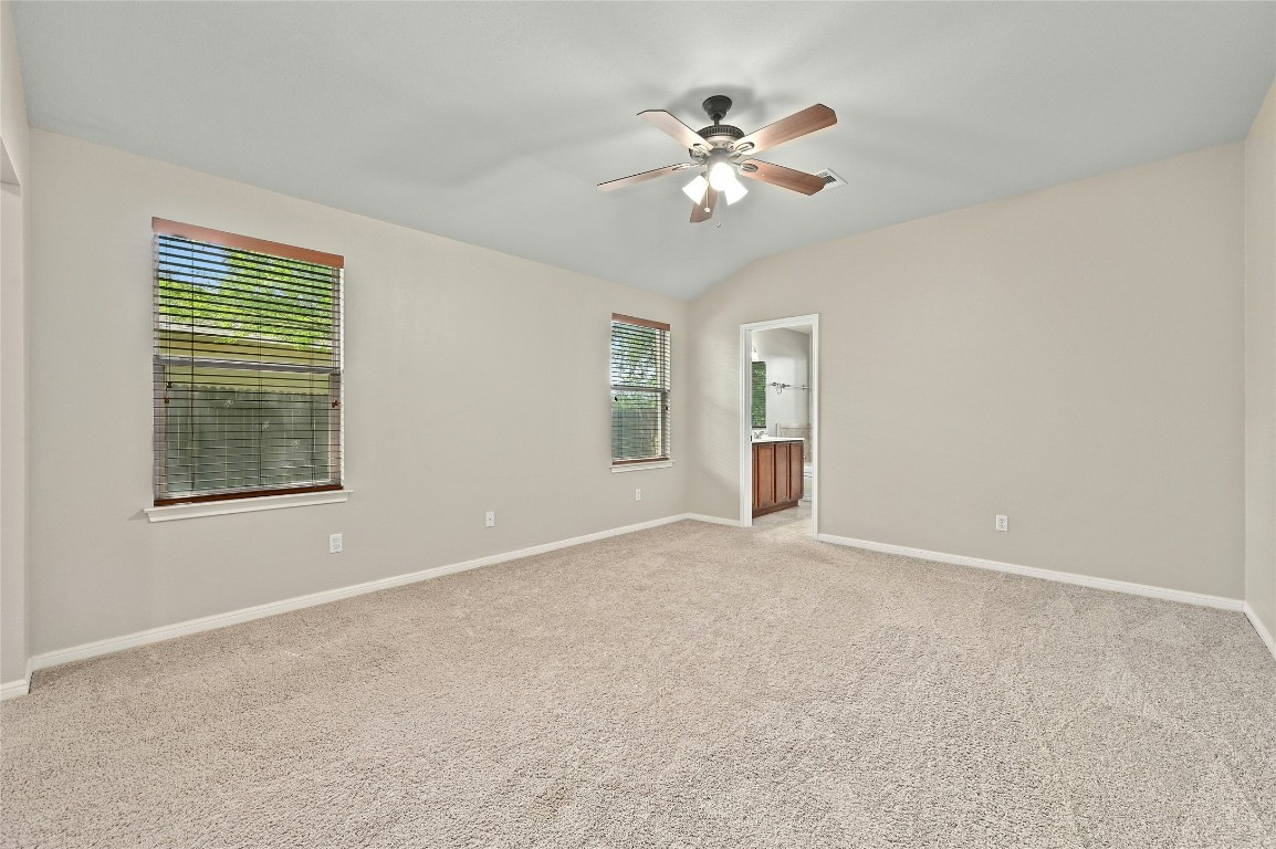 7614 Buck Meadow Drive Georgetown, TX 78628 - Photo 12 of 30 a view of an empty room with a window
