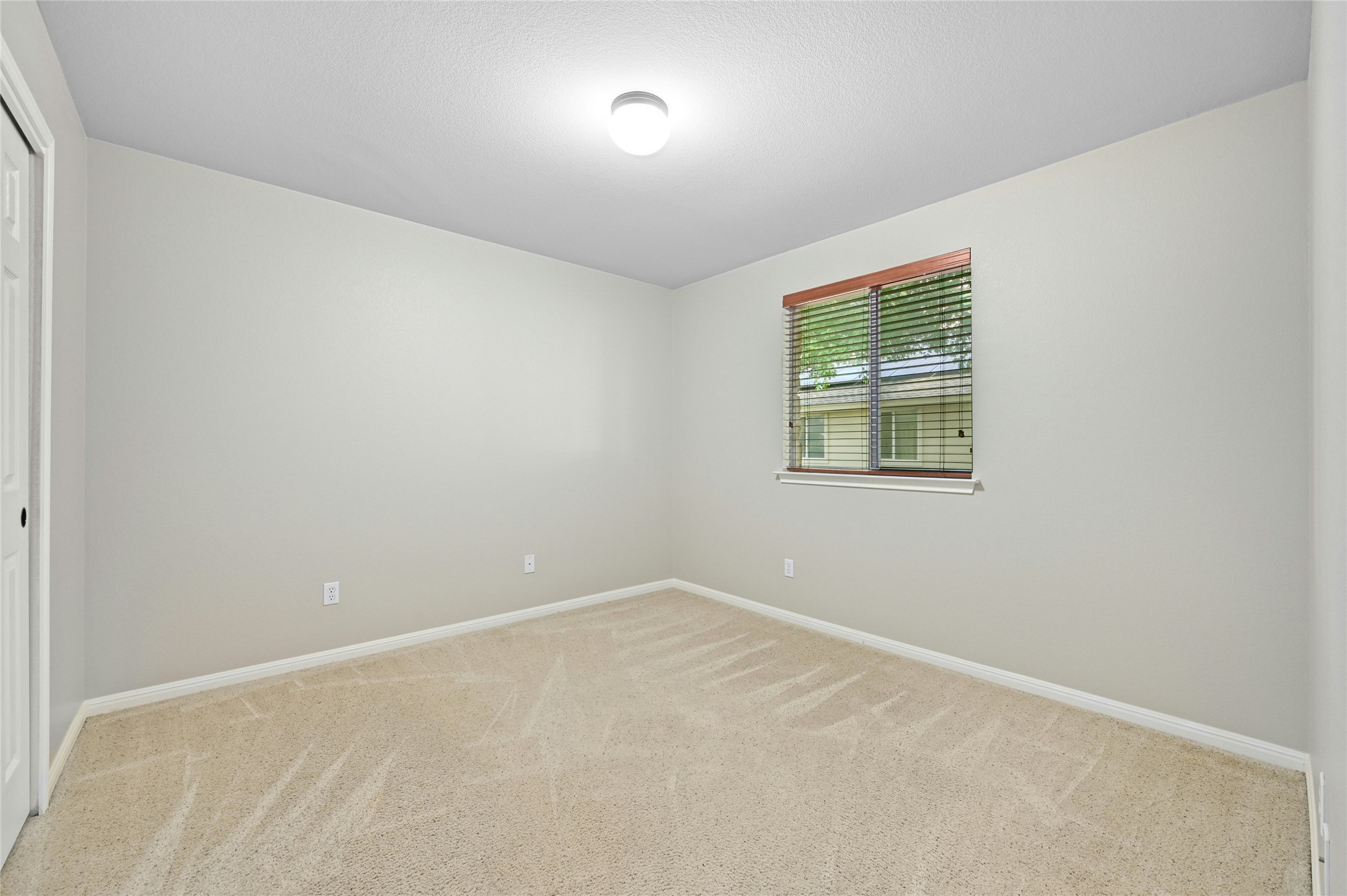 7614 Buck Meadow Drive Georgetown, TX 78628 - Photo 15 of 30 Secondary bedroom #1.