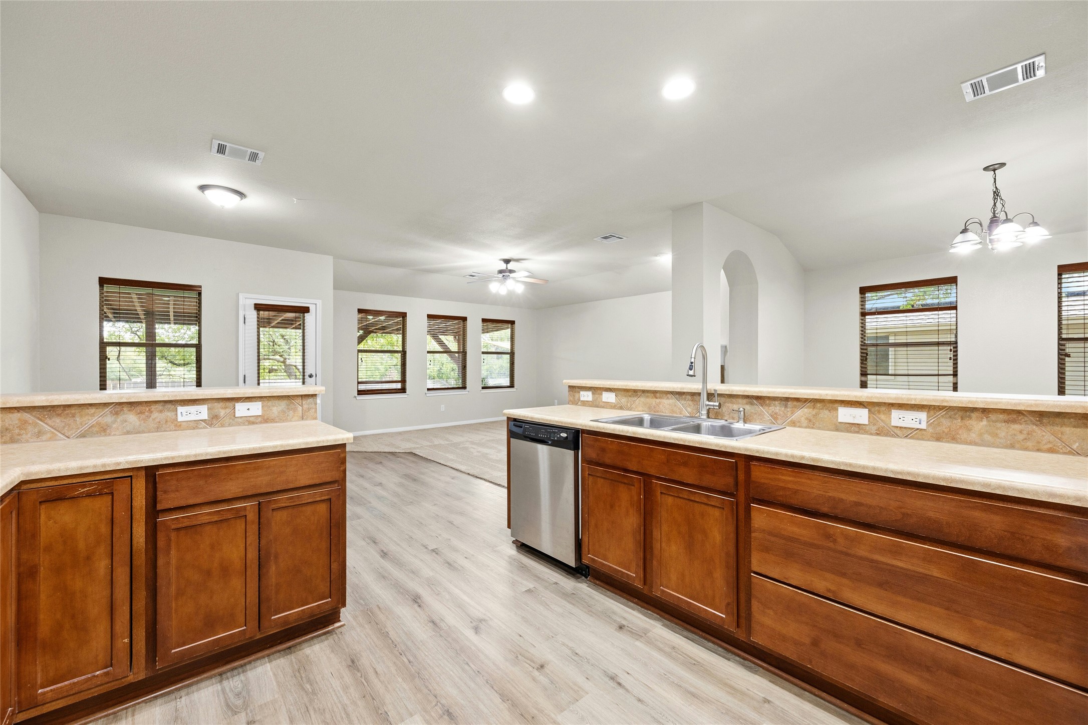 7614 Buck Meadow Drive Georgetown, TX 78628 - Photo 7 of 30 The kitchen opens to the dining, breakfast, and living areas lending itself to easy entertaining.