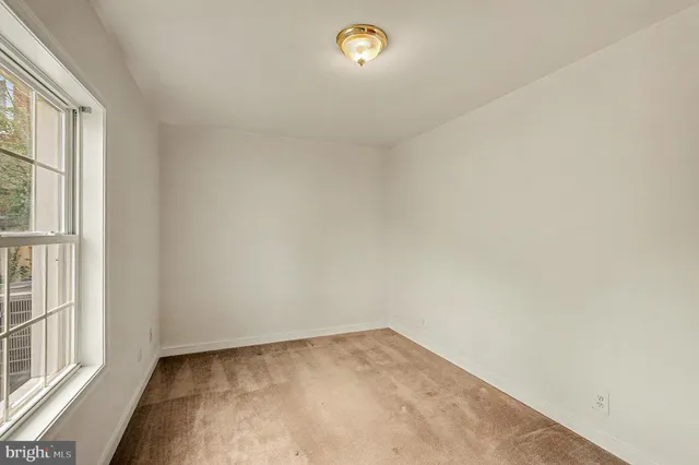an empty room with a window
