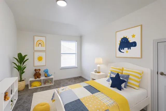 a bedroom with a bed and a couch