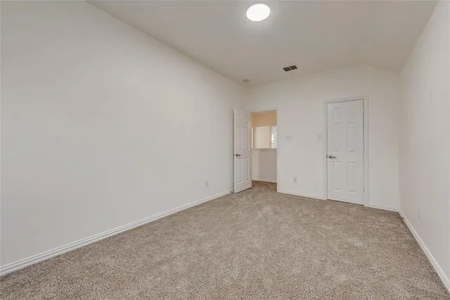 an empty room with an entryway