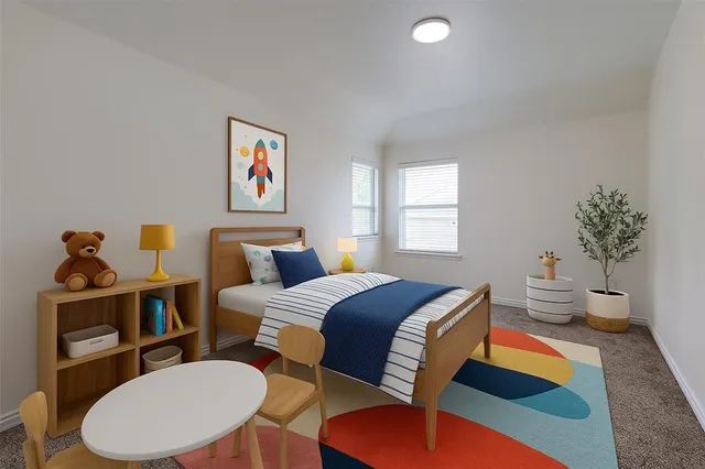 a bed room with a bed and furniture