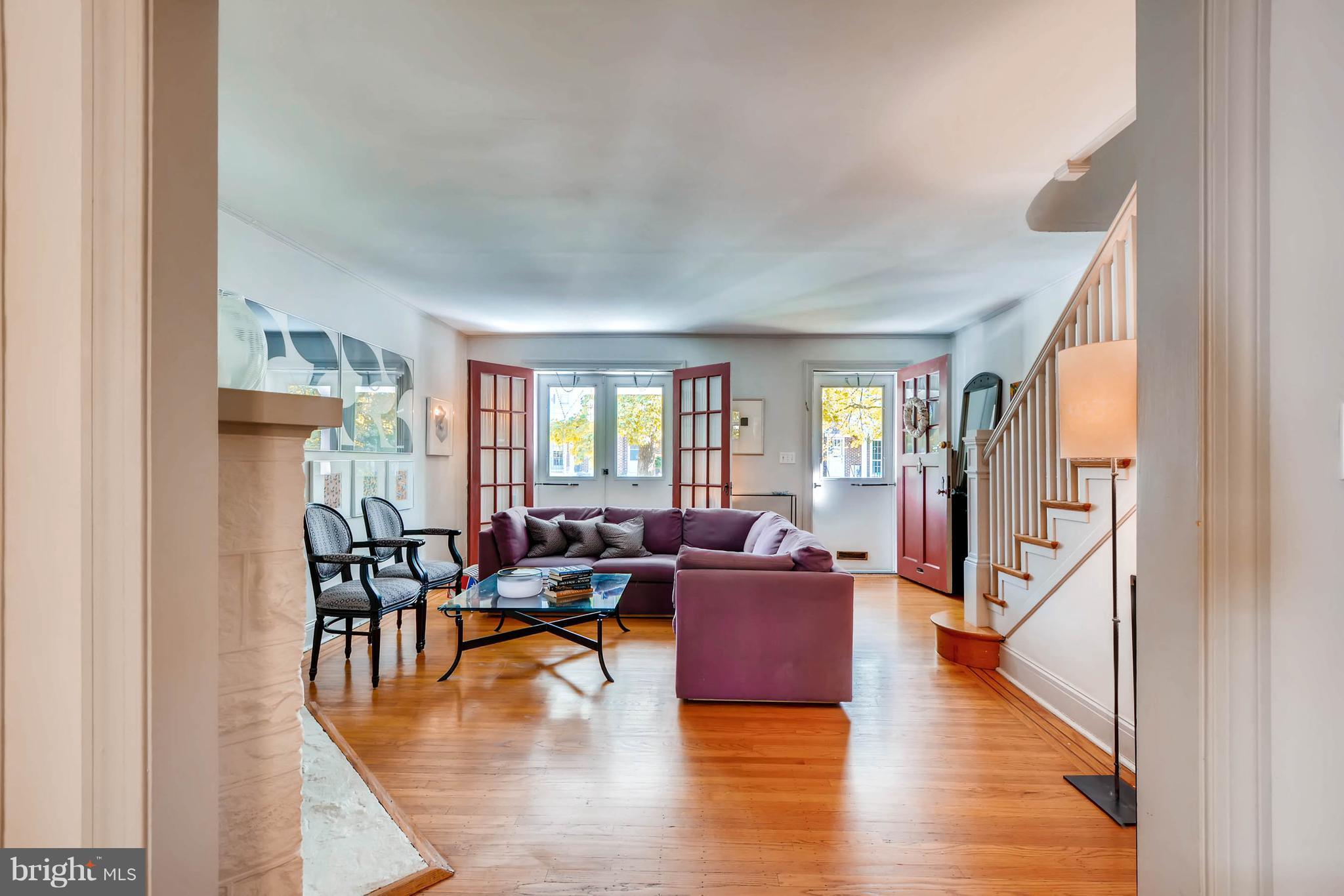 3616 Elkader Road Baltimore, MD 21218 - Photo 6 of 30 Original wood floors w/ french doors to the porch