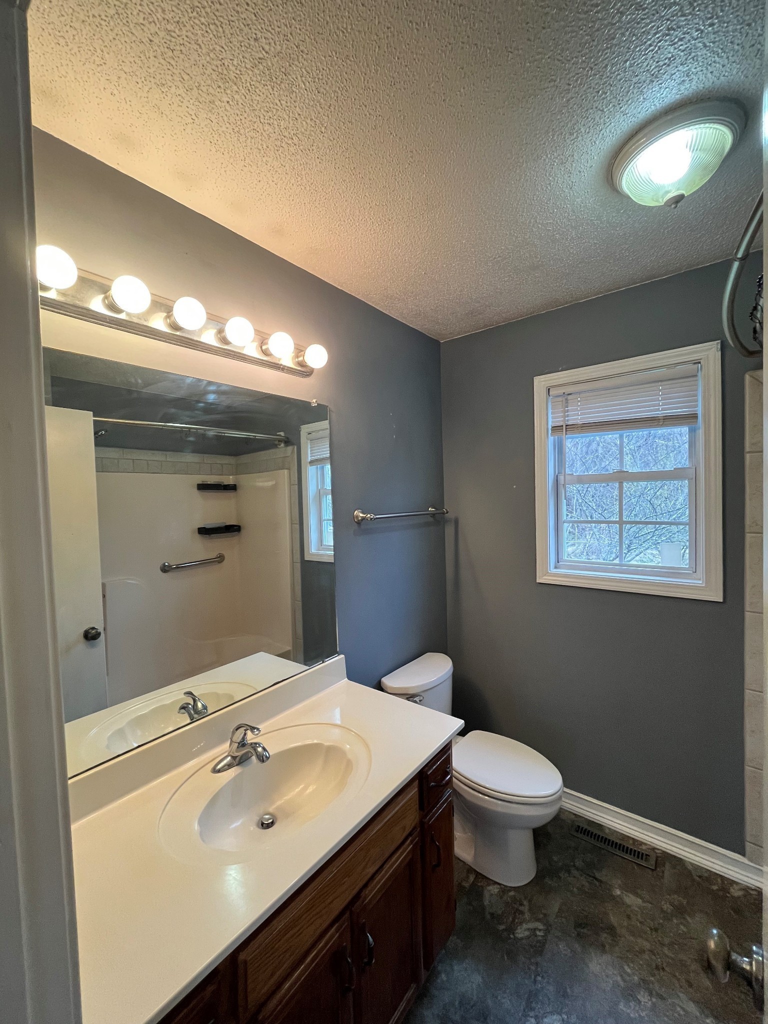 404 Sideline Drive Oak Grove, KY 42262 - Photo 6 of 14 a bathroom with a toilet sink and mirror