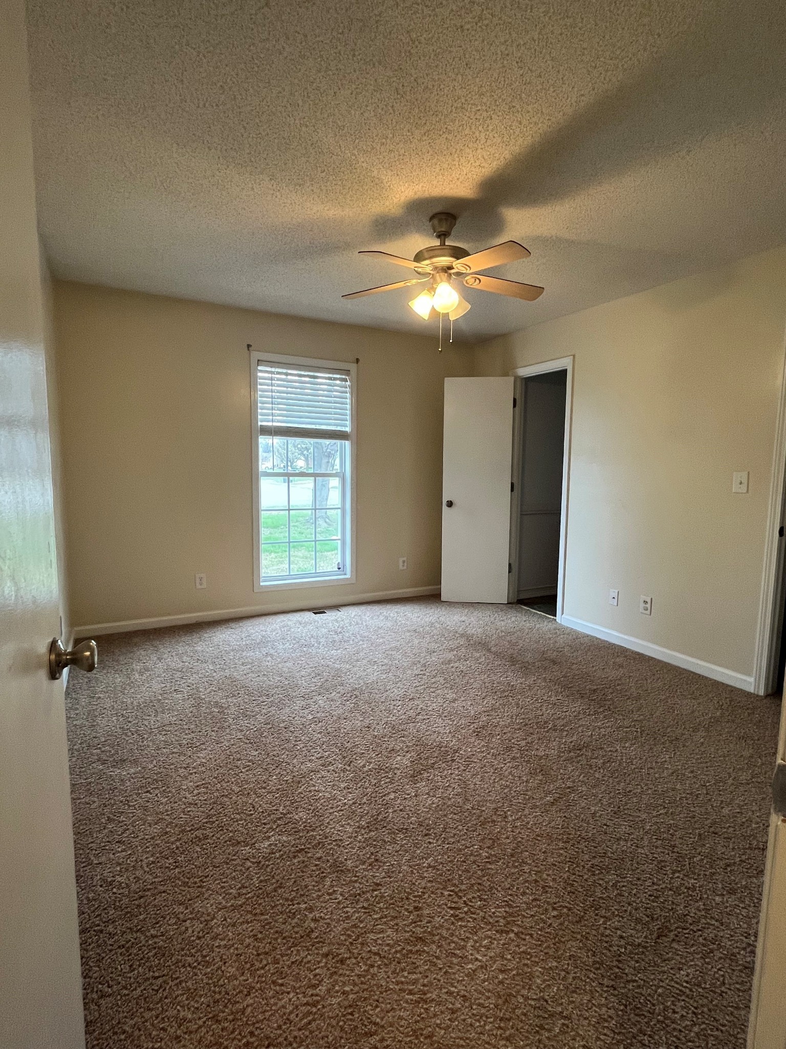 404 Sideline Drive Oak Grove, KY 42262 - Photo 9 of 14 a view of an empty room with a window