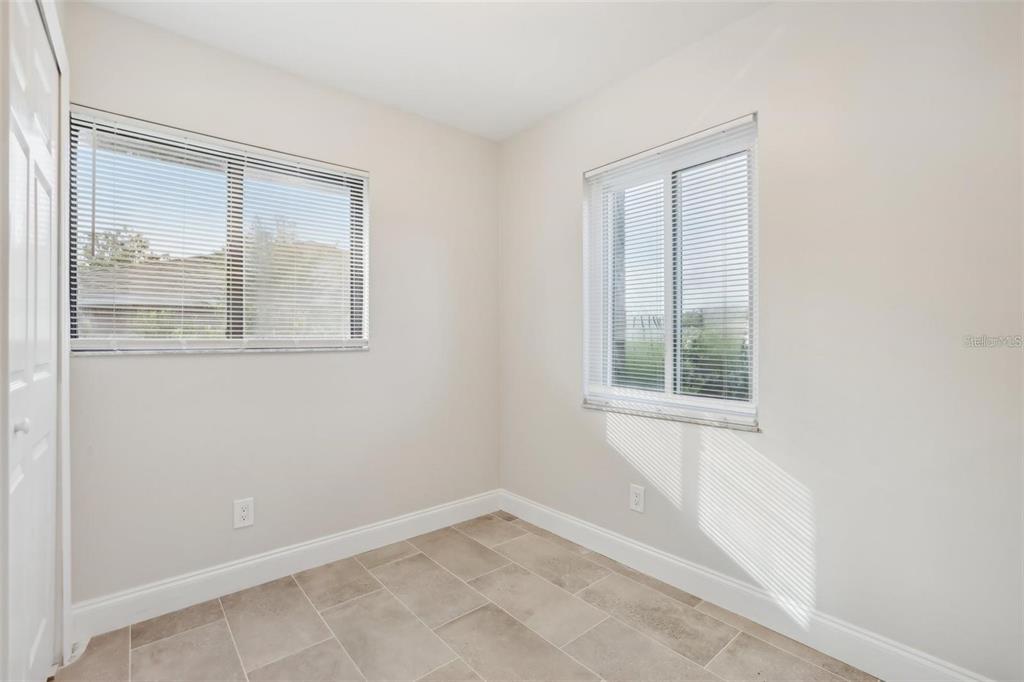 1052 Manchester Circle Winter Park, FL 32792 - Photo 11 of 41 an empty room with a window