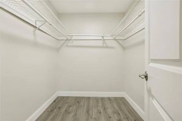 a view of a room with racks on the wall