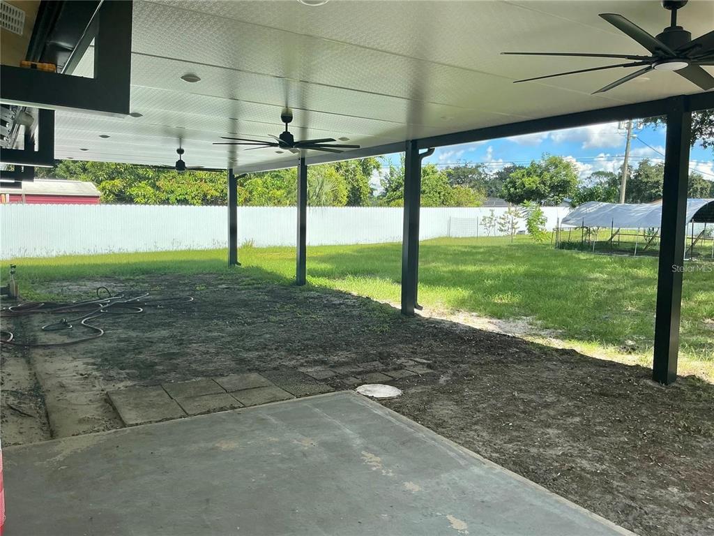 1052 Manchester Circle Winter Park, FL 32792 - Photo 37 of 41 a view of a yard with porch