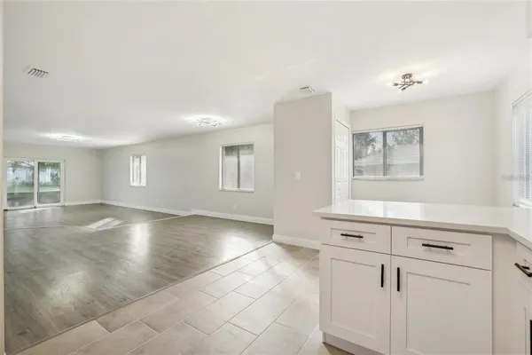 a view of cabinets and window