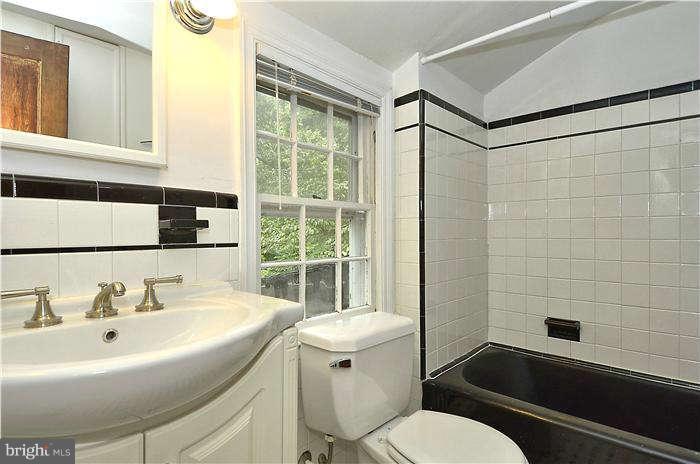 9923 Woodburn Road Silver Spring, MD 20901 - Photo 14 of 23 Full bath upstairs