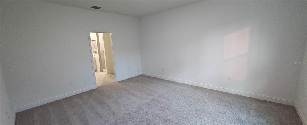 3 Undermount Path East Palm Coast, FL 32164 - Photo 10 of 13 a view of an empty room and window