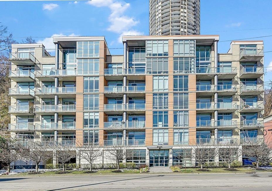 8125 River Road, Unit 3C North Bergen, NJ 07047 - Photo 1 of 24 a front view of a building with a street