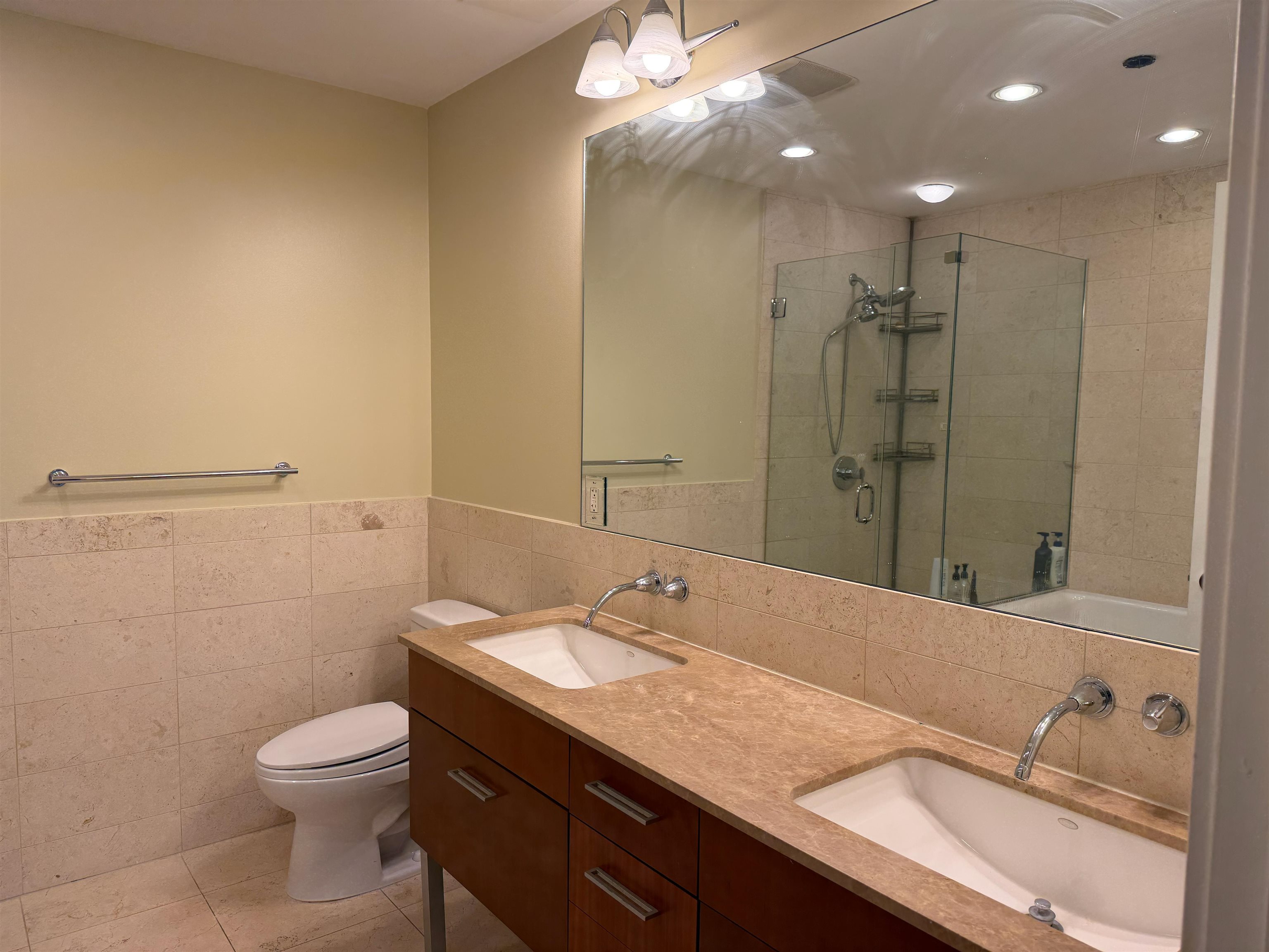 8125 River Road, Unit 3C North Bergen, NJ 07047 - Photo 12 of 24 a bathroom with a granite countertop sink a toilet and a mirror