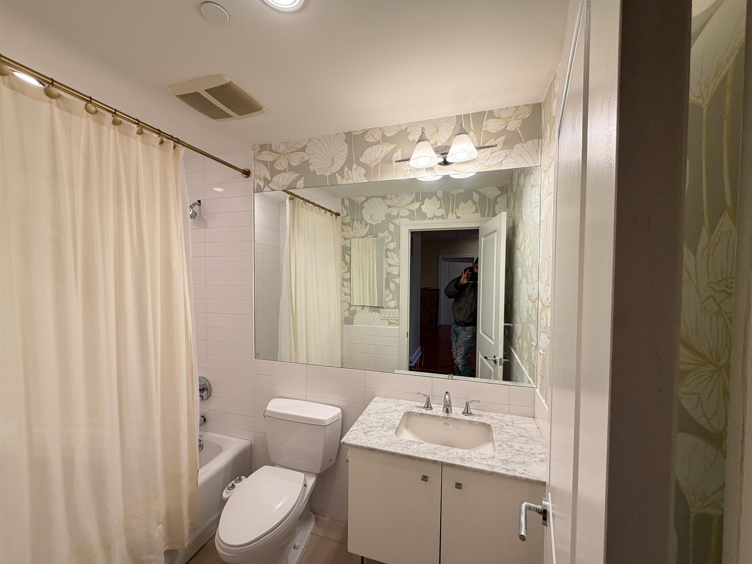 8125 River Road, Unit 3C North Bergen, NJ 07047 - Photo 19 of 24 a bathroom with a granite countertop sink toilet and shower