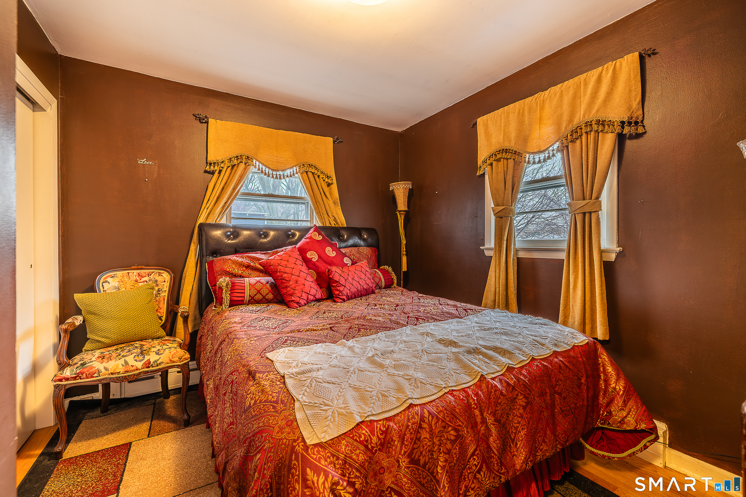 130 Holroyd Street Bridgeport, CT 06606 - Photo 18 of 29 a bedroom with a bed and a window