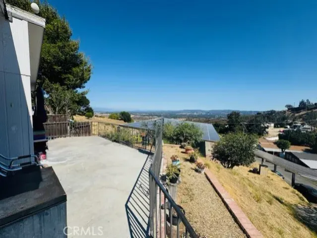 a view of a balcony with an outdoor space