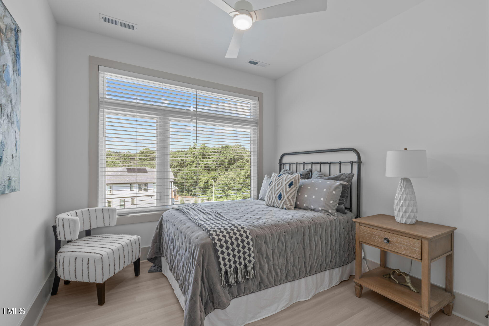1000 Addison Place, Unit 101 & 102 Raleigh, NC 27610 - Photo 15 of 40 a bedroom with a bed and a couch