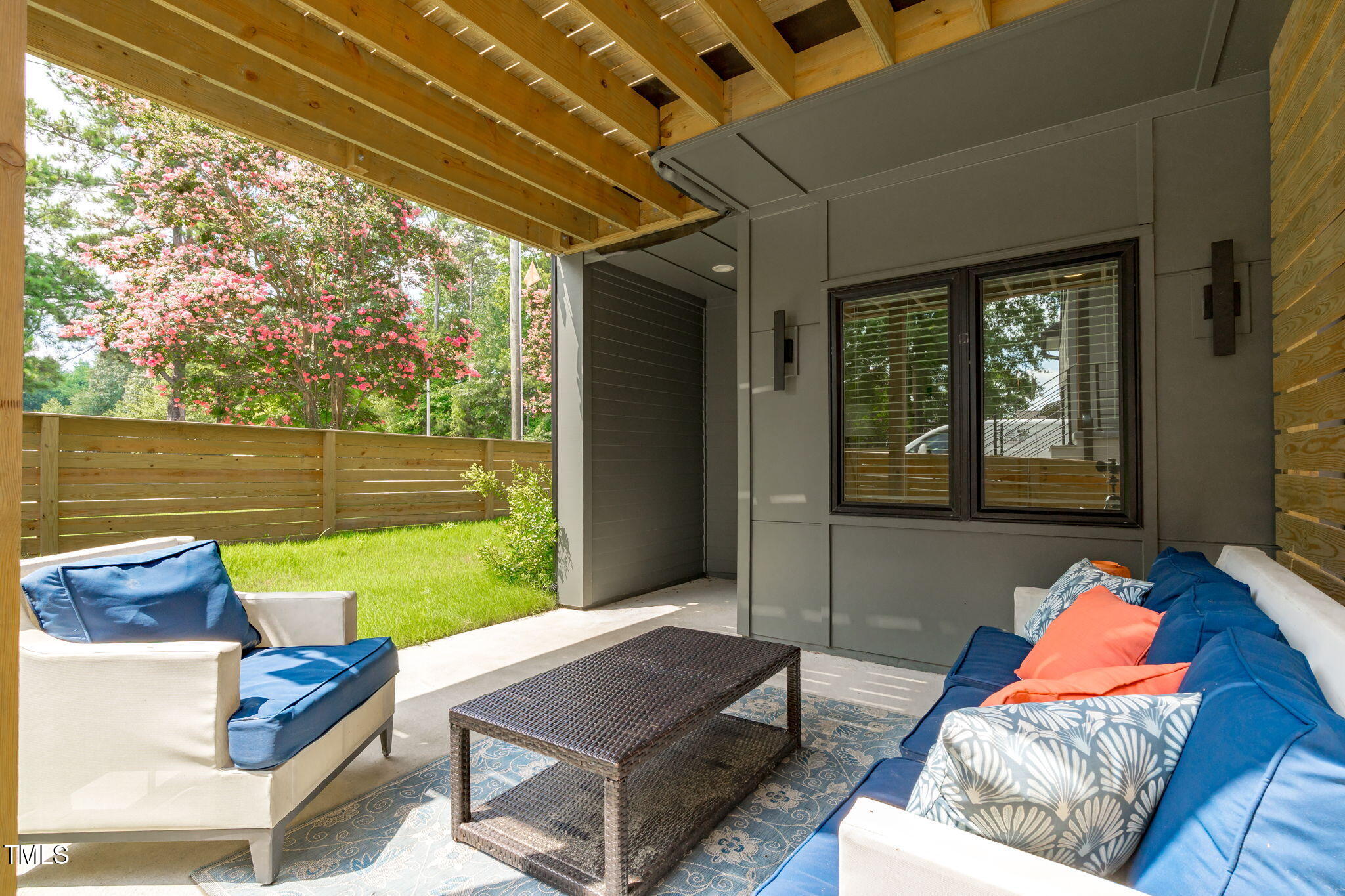 1000 Addison Place, Unit 101 & 102 Raleigh, NC 27610 - Photo 26 of 40 a backyard of a house with outdoor seating