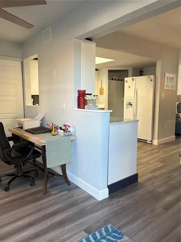 a workspace with wooden floor