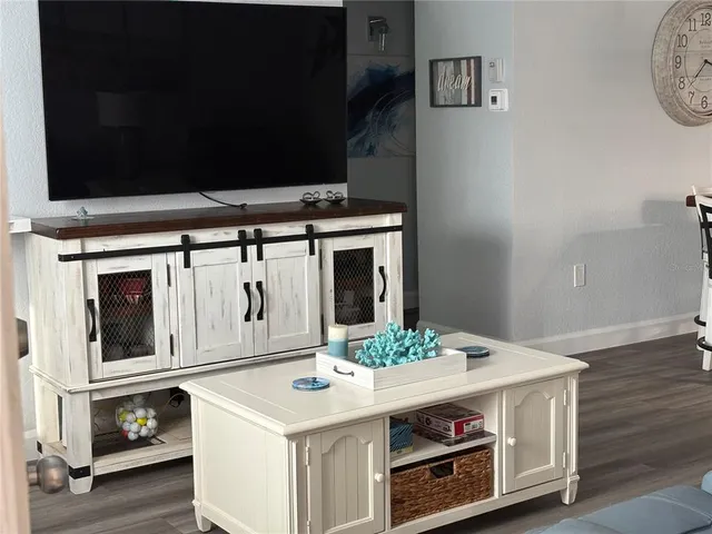 a kitchen with a stove and a microwave