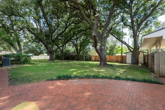 a living room with furniture or couch and a flat screen tv