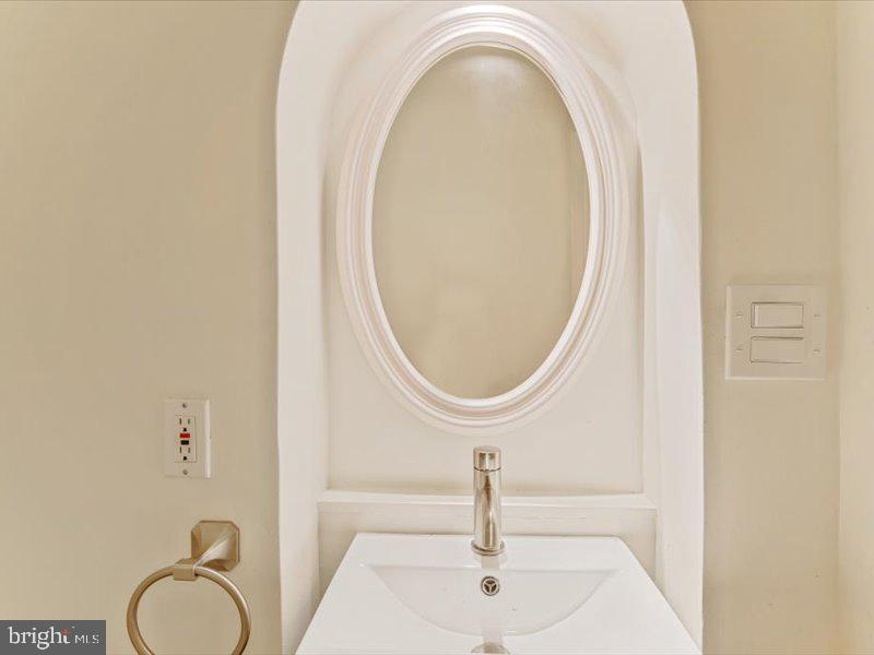 1200 D Street Northeast Washington, DC 20002 - Photo 6 of 47 Sleek elegance in a modern bath.