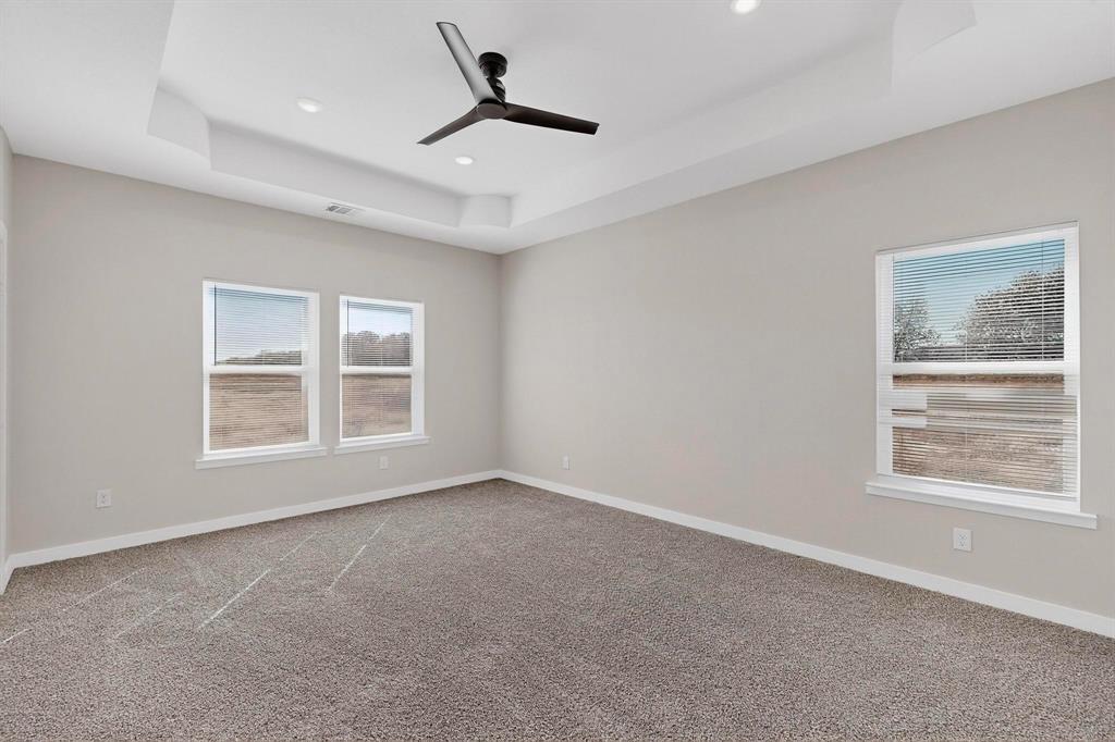 740 Section House Road Ennis, TX 75119 - Photo 13 of 31 a view of an empty room with a window