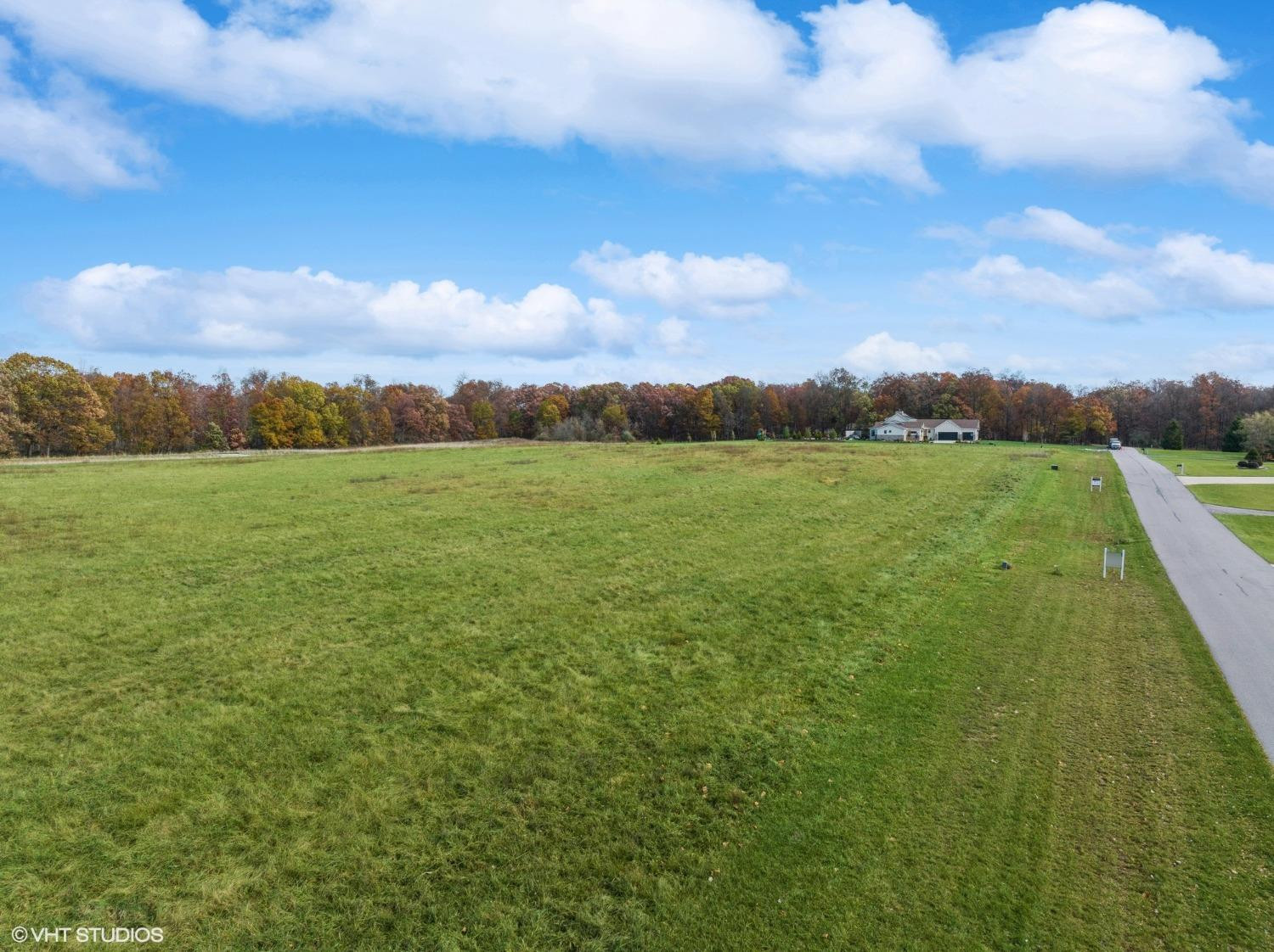 595 West 213 South Hebron, IN 46341 - Photo 20 of 25 a view of an mountain and a yard