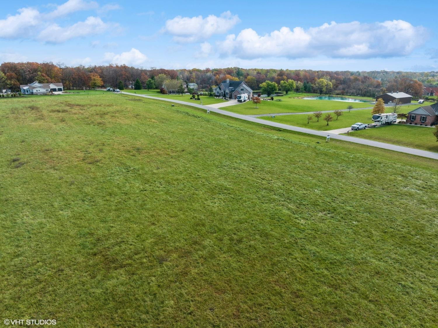 595 West 213 South Hebron, IN 46341 - Photo 23 of 25 a view of field with grass and building in the background