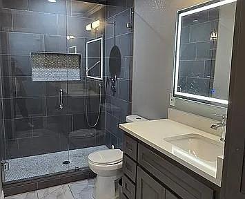 509 Royal Valley Road Grand Prairie, TX 75052 - Photo 12 of 22 a bathroom with a toilet a sink and shower