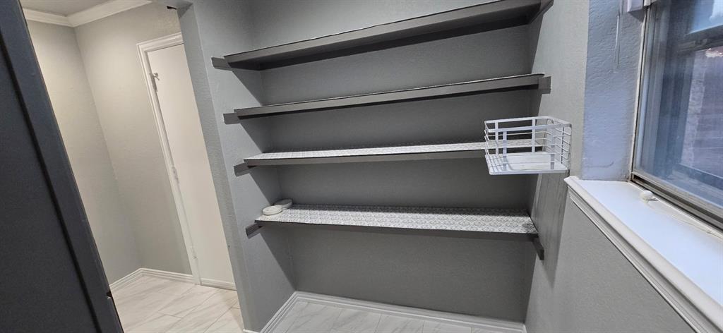 509 Royal Valley Road Grand Prairie, TX 75052 - Photo 20 of 22 a close up view of washer and dryer