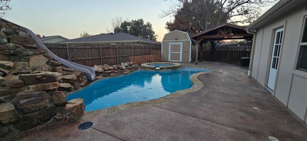 509 Royal Valley Road Grand Prairie, TX 75052 - Photo 5 of 22 a view of a house with backyard and sitting area