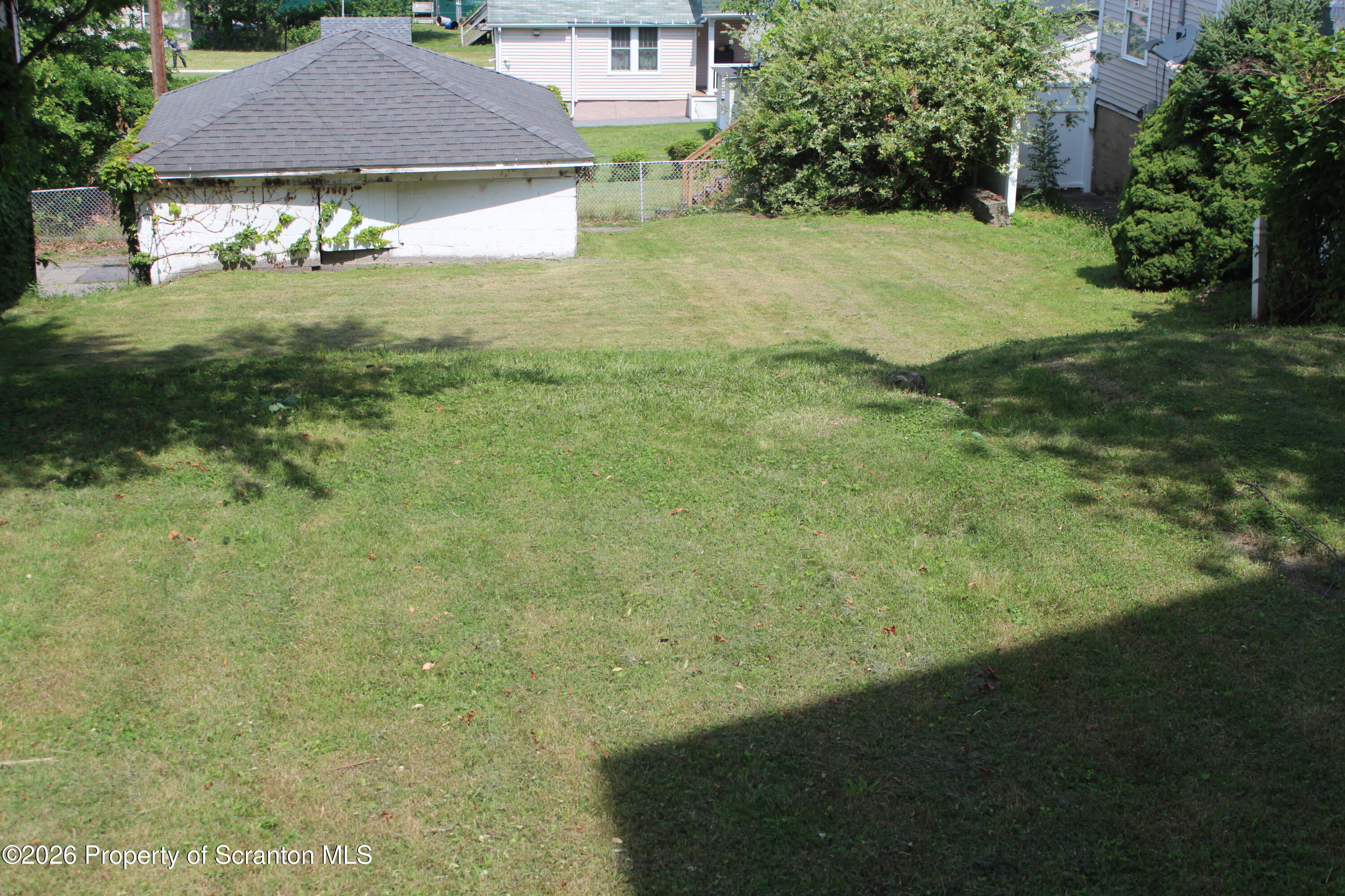 1608 Prospect Avenue Scranton, PA 18505 - Photo 26 of 30 a view of a house with a yard