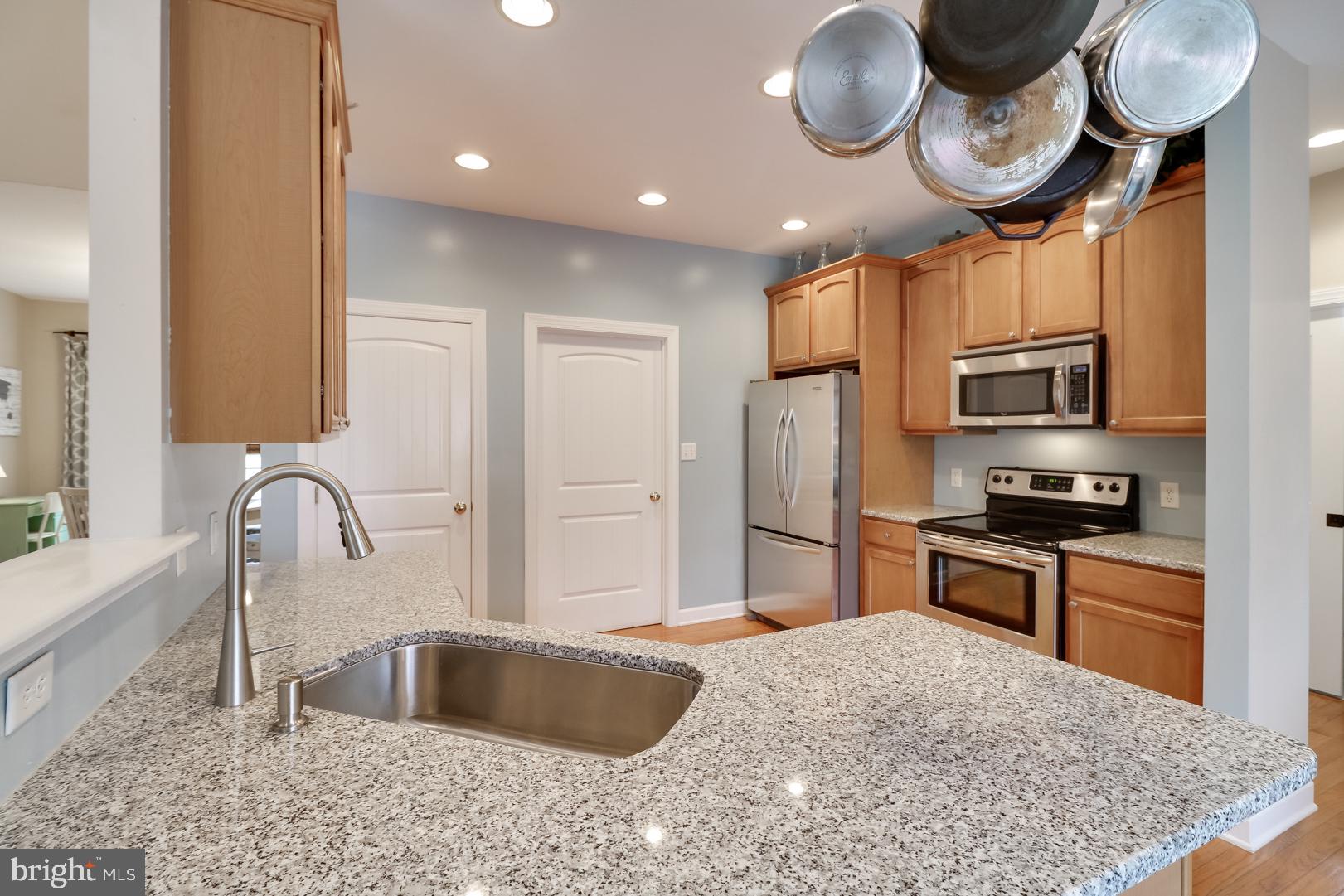 17726 Preakness Road Milton, DE 19968 - Photo 13 of 35 New granite counters and s/s farm sink (9/2020)